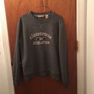 Dark gray sweatshirt.